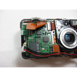Замена левой материнской платы Canon PowerShot S50